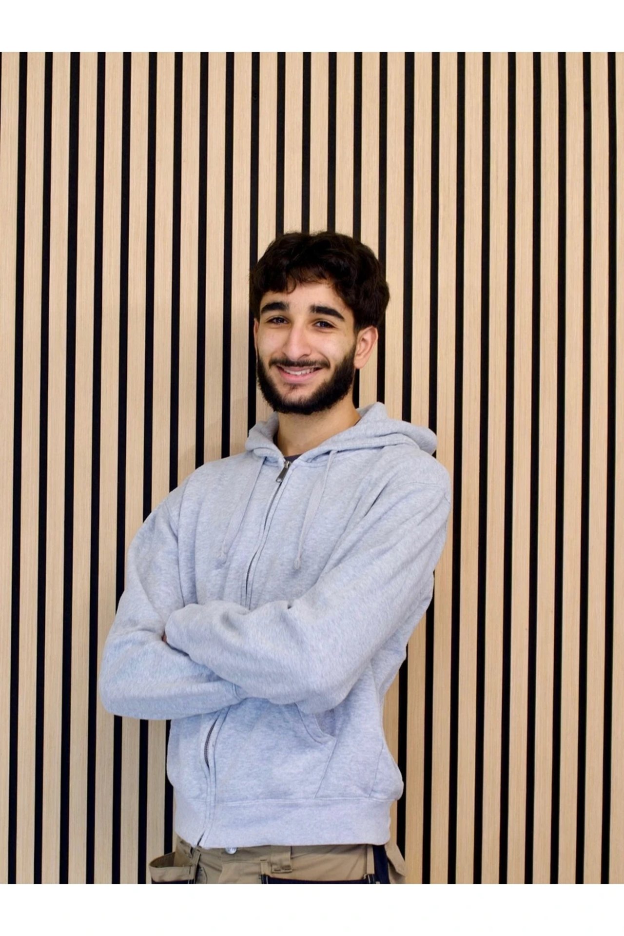 Portraitfoto von Mohamed, Monteur